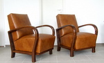 Art Deco leather armchairs.