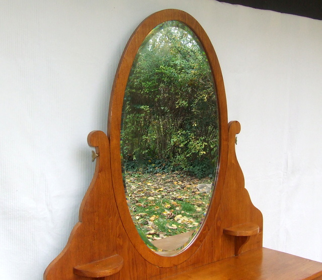 Oval mirror.