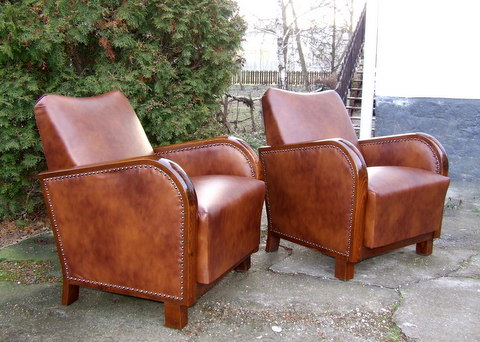 Art Deco leather armchairs.